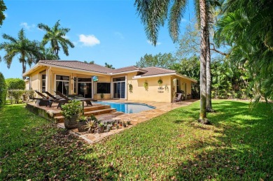 *WOW* AMAZING BRIGHT & SPACIOUS REMODELED 5 BEDROOM/3 FULL BATHS on Weston Hills Country Club in Florida - for sale on GolfHomes.com, golf home, golf lot