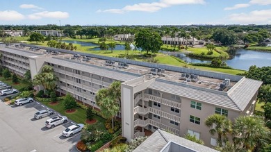 EXQUISITE 1ST FL DELUXE MODEL IN SOUGHT AFTER ARUBA VILLAGE ON on Wynmoor Golf Course in Florida - for sale on GolfHomes.com, golf home, golf lot