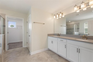 Welcome to 1423 Bunker Drive in Davenport, Florida. Situated on on The Oasis Club at Champions Gate in Florida - for sale on GolfHomes.com, golf home, golf lot