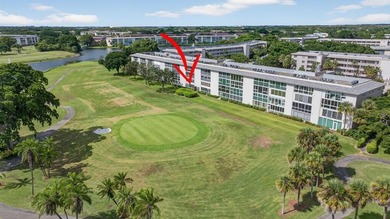 EXQUISITE 1ST FL DELUXE MODEL IN SOUGHT AFTER ARUBA VILLAGE ON on Wynmoor Golf Course in Florida - for sale on GolfHomes.com, golf home, golf lot