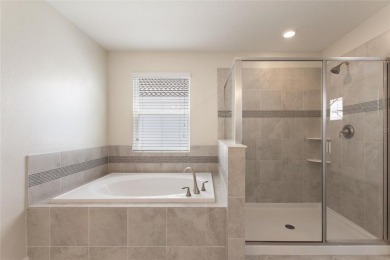 Welcome to 1423 Bunker Drive in Davenport, Florida. Situated on on The Oasis Club at Champions Gate in Florida - for sale on GolfHomes.com, golf home, golf lot
