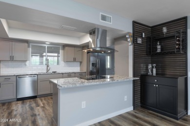Welcome to 13418 W Ashwood Dr, an impeccably remodeled Cranbrook on Pebblebrook Golf Course in Arizona - for sale on GolfHomes.com, golf home, golf lot