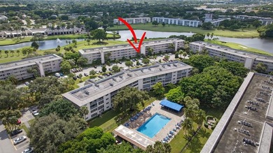 EXQUISITE 1ST FL DELUXE MODEL IN SOUGHT AFTER ARUBA VILLAGE ON on Wynmoor Golf Course in Florida - for sale on GolfHomes.com, golf home, golf lot