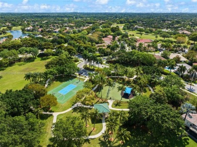 *WOW* AMAZING BRIGHT & SPACIOUS REMODELED 5 BEDROOM/3 FULL BATHS on Weston Hills Country Club in Florida - for sale on GolfHomes.com, golf home, golf lot