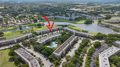 EXQUISITE 1ST FL DELUXE MODEL IN SOUGHT AFTER ARUBA VILLAGE ON on Wynmoor Golf Course in Florida - for sale on GolfHomes.com, golf home, golf lot