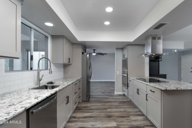Welcome to 13418 W Ashwood Dr, an impeccably remodeled Cranbrook on Pebblebrook Golf Course in Arizona - for sale on GolfHomes.com, golf home, golf lot