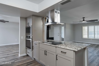 Welcome to 13418 W Ashwood Dr, an impeccably remodeled Cranbrook on Pebblebrook Golf Course in Arizona - for sale on GolfHomes.com, golf home, golf lot