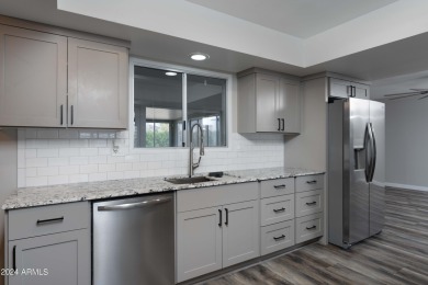 Welcome to 13418 W Ashwood Dr, an impeccably remodeled Cranbrook on Pebblebrook Golf Course in Arizona - for sale on GolfHomes.com, golf home, golf lot