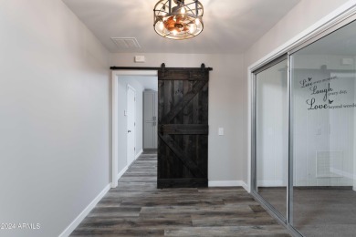 Welcome to 13418 W Ashwood Dr, an impeccably remodeled Cranbrook on Pebblebrook Golf Course in Arizona - for sale on GolfHomes.com, golf home, golf lot