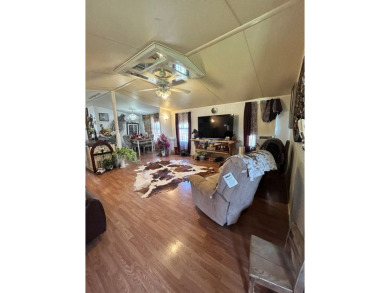 Nice and Open 3 bedroom 2 bath Manufactured home. Large backyard on Mountain Creek Golf Club in Texas - for sale on GolfHomes.com, golf home, golf lot
