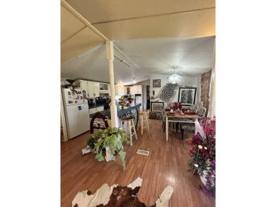 Nice and Open 3 bedroom 2 bath Manufactured home. Large backyard on Mountain Creek Golf Club in Texas - for sale on GolfHomes.com, golf home, golf lot