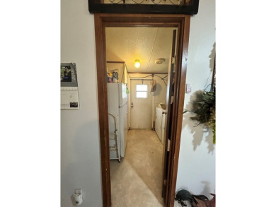 Nice and Open 3 bedroom 2 bath Manufactured home. Large backyard on Mountain Creek Golf Club in Texas - for sale on GolfHomes.com, golf home, golf lot