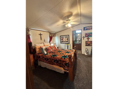 Nice and Open 3 bedroom 2 bath Manufactured home. Large backyard on Mountain Creek Golf Club in Texas - for sale on GolfHomes.com, golf home, golf lot