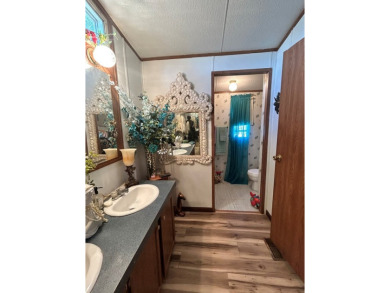Nice and Open 3 bedroom 2 bath Manufactured home. Large backyard on Mountain Creek Golf Club in Texas - for sale on GolfHomes.com, golf home, golf lot