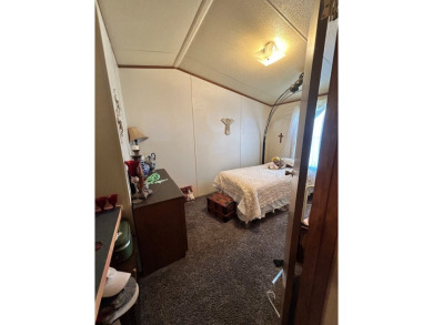 Nice and Open 3 bedroom 2 bath Manufactured home. Large backyard on Mountain Creek Golf Club in Texas - for sale on GolfHomes.com, golf home, golf lot