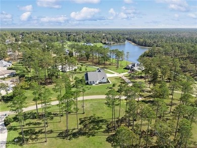Wake up to serene lake views and end each day with unforgettable on Money Hill Golf and Country Club in Louisiana - for sale on GolfHomes.com, golf home, golf lot