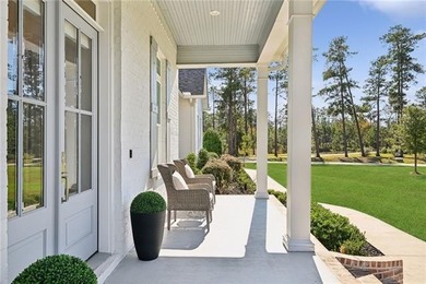 Wake up to serene lake views and end each day with unforgettable on Money Hill Golf and Country Club in Louisiana - for sale on GolfHomes.com, golf home, golf lot