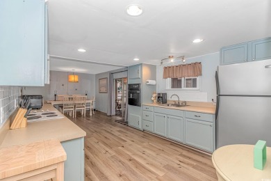 This very open and spacious 4-Bedroom, 2 Bath beach house is on Prestwick Country Club in South Carolina - for sale on GolfHomes.com, golf home, golf lot