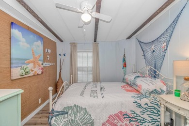 This very open and spacious 4-Bedroom, 2 Bath beach house is on Prestwick Country Club in South Carolina - for sale on GolfHomes.com, golf home, golf lot