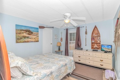 This very open and spacious 4-Bedroom, 2 Bath beach house is on Prestwick Country Club in South Carolina - for sale on GolfHomes.com, golf home, golf lot