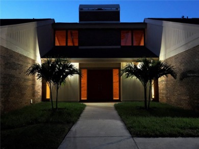 VACATION WHERE YOU LIVE... UNIQUE RARE OPPORTUNITY to own this on East Lake Woodlands Country Club in Florida - for sale on GolfHomes.com, golf home, golf lot