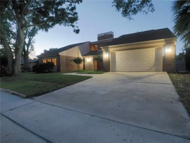 VACATION WHERE YOU LIVE... UNIQUE RARE OPPORTUNITY to own this on East Lake Woodlands Country Club in Florida - for sale on GolfHomes.com, golf home, golf lot