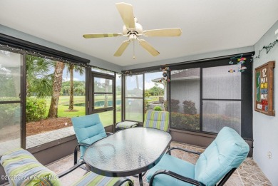 Beautiful expanded Raleigh model with water, golf course, and on Indian River Colony Club in Florida - for sale on GolfHomes.com, golf home, golf lot