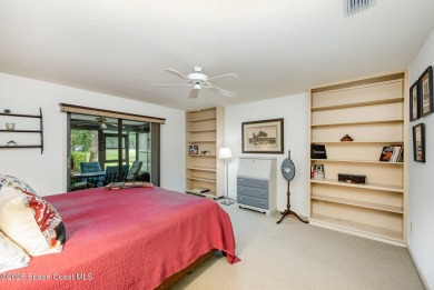 Beautiful expanded Raleigh model with water, golf course, and on Indian River Colony Club in Florida - for sale on GolfHomes.com, golf home, golf lot