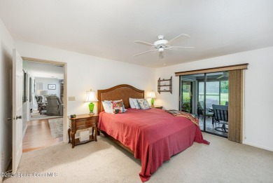 Beautiful expanded Raleigh model with water, golf course, and on Indian River Colony Club in Florida - for sale on GolfHomes.com, golf home, golf lot