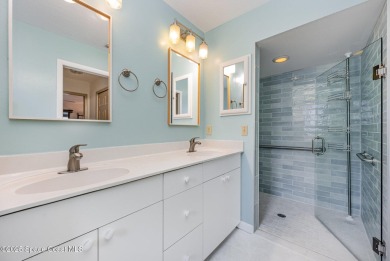 Beautiful expanded Raleigh model with water, golf course, and on Indian River Colony Club in Florida - for sale on GolfHomes.com, golf home, golf lot