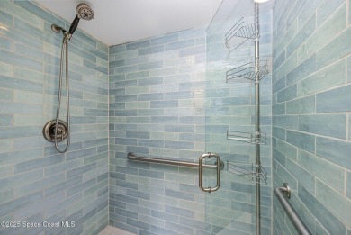 Beautiful expanded Raleigh model with water, golf course, and on Indian River Colony Club in Florida - for sale on GolfHomes.com, golf home, golf lot