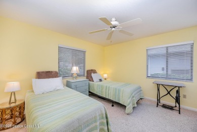 Beautiful expanded Raleigh model with water, golf course, and on Indian River Colony Club in Florida - for sale on GolfHomes.com, golf home, golf lot