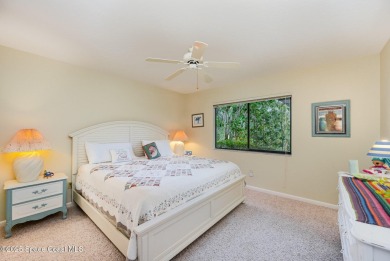 Beautiful expanded Raleigh model with water, golf course, and on Indian River Colony Club in Florida - for sale on GolfHomes.com, golf home, golf lot