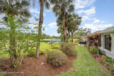 Beautiful expanded Raleigh model with water, golf course, and on Indian River Colony Club in Florida - for sale on GolfHomes.com, golf home, golf lot