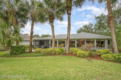 Beautiful expanded Raleigh model with water, golf course, and on Indian River Colony Club in Florida - for sale on GolfHomes.com, golf home, golf lot
