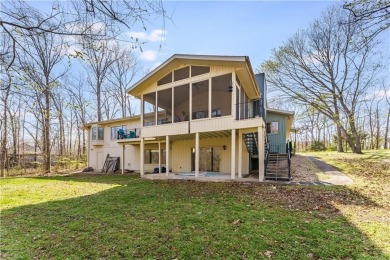 Welcome to The Huskins Home offering you a blend of comfort on Bella Vista Country Club - Highlands in Arkansas - for sale on GolfHomes.com, golf home, golf lot