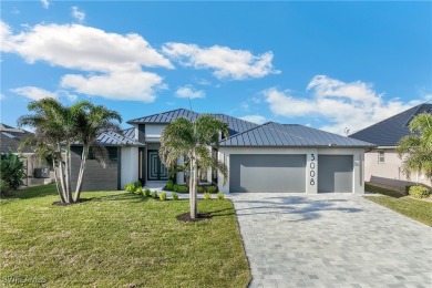 This stunning new construction home offers the perfect blend of on Royal Tee Country Club in Florida - for sale on GolfHomes.com, golf home, golf lot