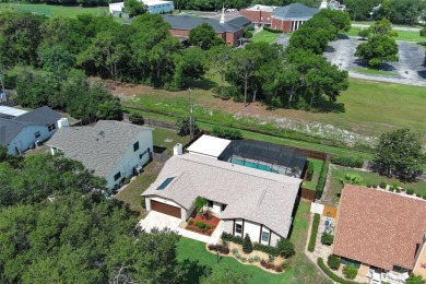 Welcome to this Beautifully Remodeled Gem of a Home, tucked away on Rio Pinar Golf and Country Club in Florida - for sale on GolfHomes.com, golf home, golf lot