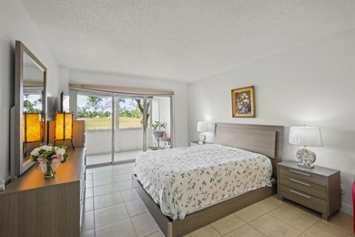 Light, bright, & timelessly renovated 2-bed, 2-bath, 1st-floor on Poinciana Golf Club in Florida - for sale on GolfHomes.com, golf home, golf lot