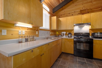 A cut above the rest. Built by one of Volcano's finest general on Volcano Golf and Country Club in Hawaii - for sale on GolfHomes.com, golf home, golf lot