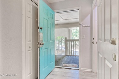 Fabulous golf course views from this beautifully remodeled TOP on Sea Trail Golf Resort in North Carolina - for sale on GolfHomes.com, golf home, golf lot