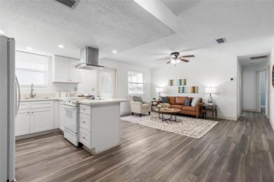 RELAX BY THE RIVER IN THIS MOVE-IN READY RETREAT ON REEF ROAD! on Daytona Beach Golf Club in Florida - for sale on GolfHomes.com, golf home, golf lot