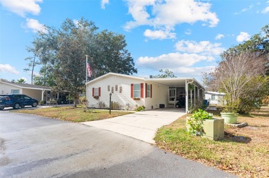 Check out this beautiful, 55+ community that is full of trees on Rivard Golf and Country Club in Florida - for sale on GolfHomes.com, golf home, golf lot