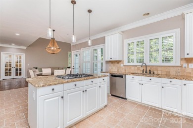 Step into this stunning 4-brf, 2.5-bath brick-front home on Northstone Country Club in North Carolina - for sale on GolfHomes.com, golf home, golf lot