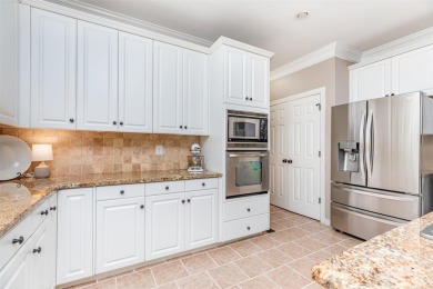 Step into this stunning 4-brf, 2.5-bath brick-front home on Northstone Country Club in North Carolina - for sale on GolfHomes.com, golf home, golf lot