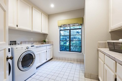 Shaded by towering redwoods and nestled beside the Palo Alto on Palo Alto Hills Golf and Country Club in California - for sale on GolfHomes.com, golf home, golf lot