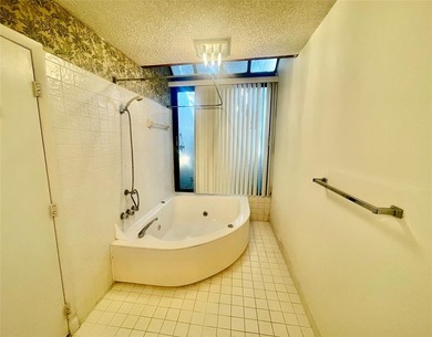 Unique open concept studio/efficiency type condo in the on Deer Creek Golf Club in Florida - for sale on GolfHomes.com, golf home, golf lot
