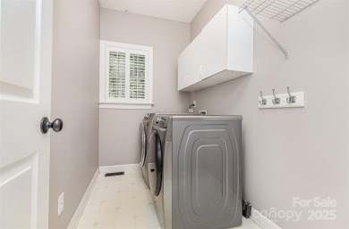 Step into this stunning 4-brf, 2.5-bath brick-front home on Northstone Country Club in North Carolina - for sale on GolfHomes.com, golf home, golf lot