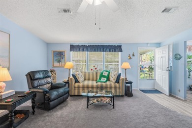 Check out this beautiful, 55+ community that is full of trees on Rivard Golf and Country Club in Florida - for sale on GolfHomes.com, golf home, golf lot