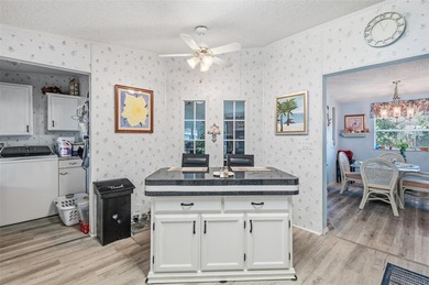 Check out this beautiful, 55+ community that is full of trees on Rivard Golf and Country Club in Florida - for sale on GolfHomes.com, golf home, golf lot